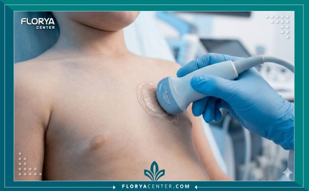 لقطة قريبة لجهاز الإيكو أثناء فحص قلب الطفل لضمان الدقة في التشخيص.