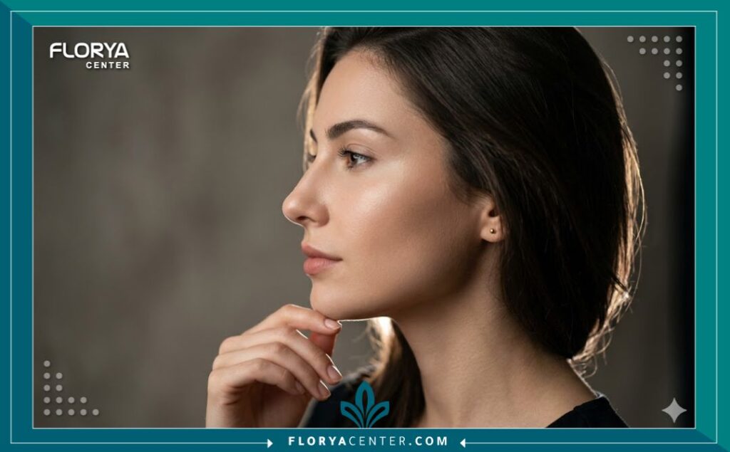 حجز موعد استشارة تجميل أنف 5 صورة جانبية لامرأة بملامح جذابة وأنف متناسق تبرز نتائج عمليات تجميل الأنف الناجحة.